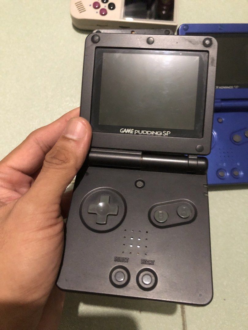 Defective GBA SP units and anbernic handheld (Category: Others) located in Quezon City. Submitted by markgolveo (Listing ID 1441289379, Image 3). Description: Defective GBA SP units and anbernic handheld All items are considered defective Untested for parts out repairs Sba sp units has no batteries Anbernic unit broken screen With power not charging 2 pcs gba sp 100 1 pc game pudding 1 anbernic.