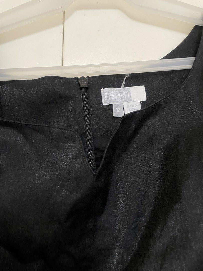 Esprit Structured Black Sleeveless V-Neck Top Size 12 (Category: Sleeveless) located in Calamba. Submitted by melibear (Listing ID 1441344181, Image 2). Description: - Brand: Esprit - Color: Black - Style: Sleeveless top - Neckline: V-neck - Closure: Zip at the back - Fabric: Subtle sheen - Fit: Fitted style - Size: 12 (best fit small to large) - Occasion: Great for dressing up or down.