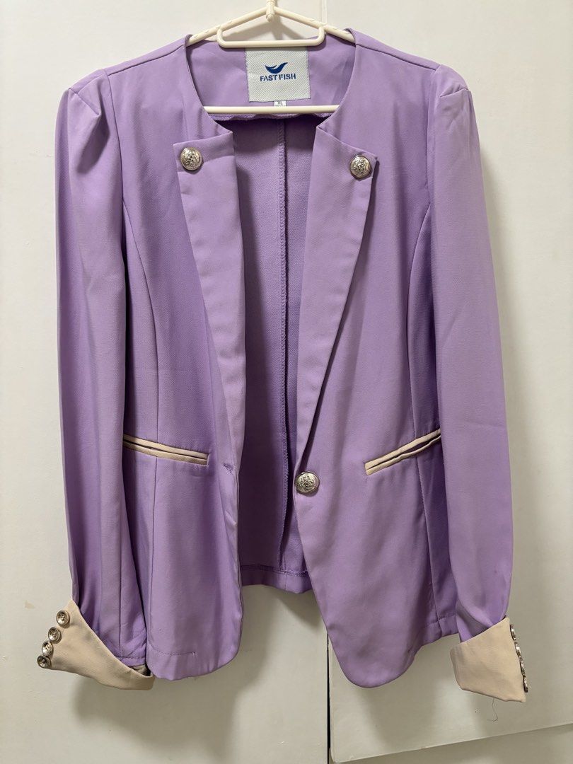 FASTFISH Purple Blazer with Gold Button Details (Category: Coats, Jackets and Outerwear) located in Iloilo. Submitted by clesha_2279 (Listing ID 1441262612, Image 2). Description: - FASTFISH purple blazer - Collarless design - Gold button accents on front and cuffs - Light beige lining on cuffs - Ideal for dressing up outfits and adding a sharp, stylish touch.