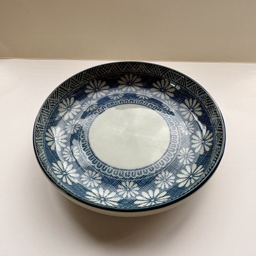 Floral Ceramic Plate (Category: Dinnerware & Cutlery) located in Antipolo. Submitted by anabri (Listing ID 1441323520, Image 2). Description: - Elegant blue and white ceramic plate - Features a charming floral pattern - Ideal for serving dishes or as a decorative accent .