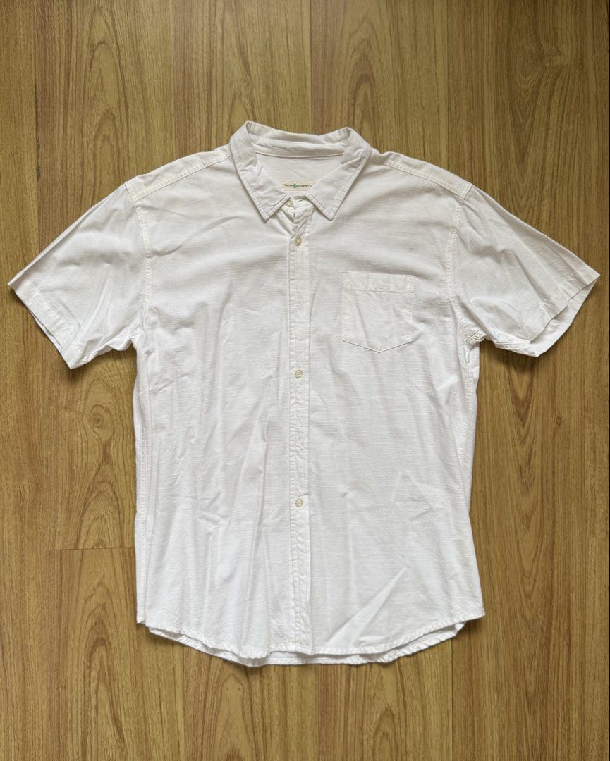 Fresh Element Short Sleeve Button-down Polo Shirt (Category: Tshirts & Polo Shirts ) located in Taytay. Submitted by nextsentials (Listing ID 1441213481, Image 1). Description: - Authentic Fresh Element short sleeve button-down polo shirt - Pure white color - Comfortable, regular fit - Good for casual, everyday use Measurements: Body length - 72cm Chest width - 52cm Shoulder width - 46cm Sleeve length - 23cm.