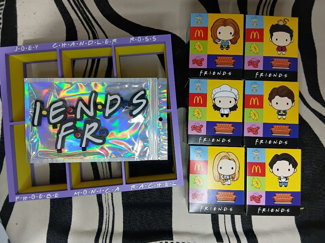 Friends Collectibles Set with Display Frame (Category: Figurines & Statues) located in Quezon City. Submitted by mtchndr (Listing ID 1441229494, Image 1). Description: F.R.I.E.N.D.S x McDonald's collaboration figures - Complete set of McDonald's Friends collectibles - Features all 6 main characters in individual boxes - Comes with a custom display frame with character names - All items are in their original, unopened packaging (brand new/sealed s