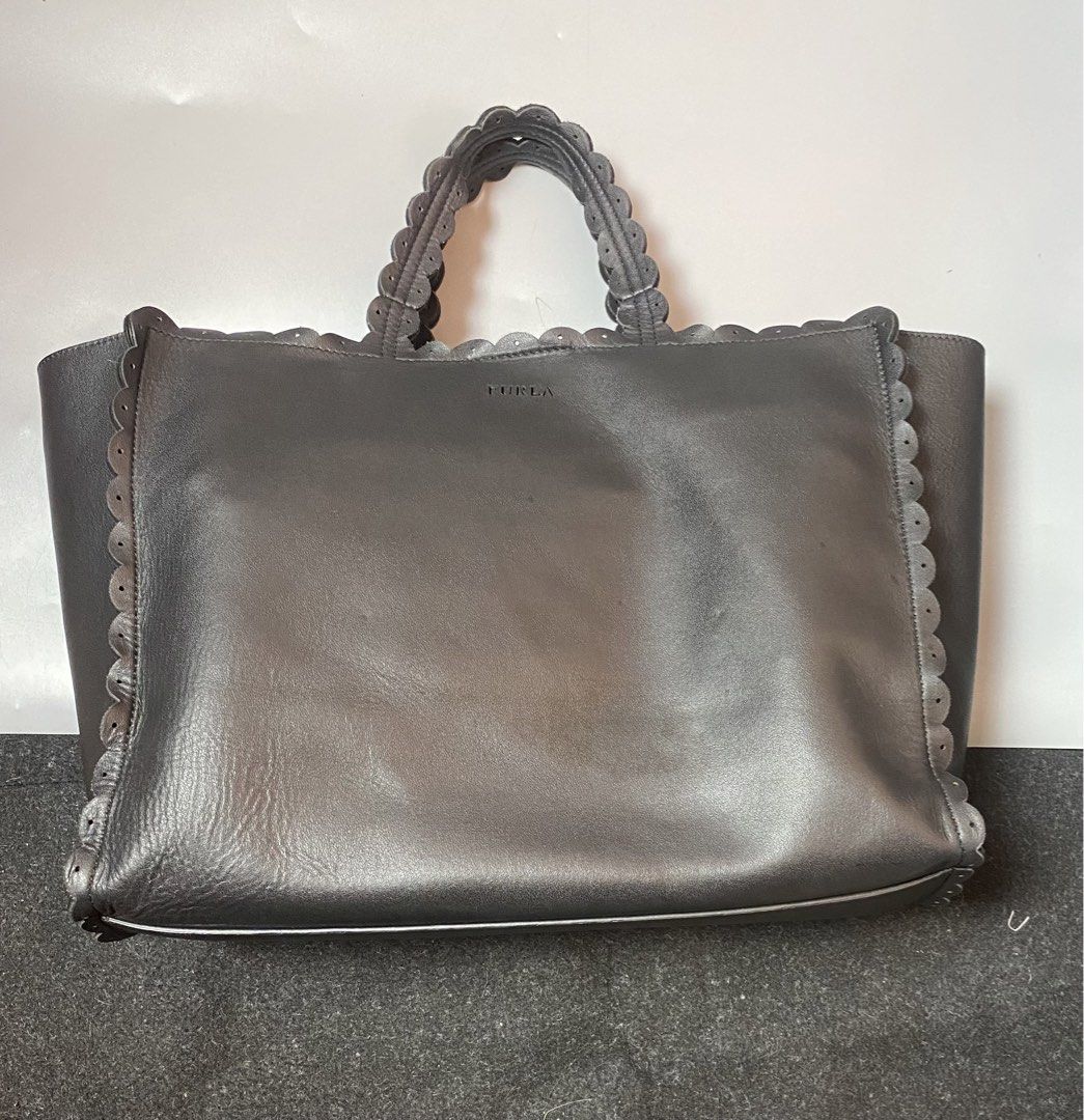 FURLA 2way Bag Black Leather (Category: Cross-body Bags) located in Quezon City. Submitted by loloyz123 (Listing ID 1441299197, Image 1). Description: FURLA 2way Bag Black Leather Condition: Very good/ Replace Sling Color rate: 9.8/10 Color: Black Size: Length: 10 Width: 13.2 Depth: 5.5 inches .