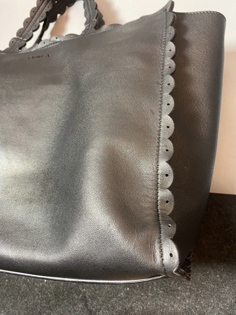 FURLA 2way Bag Black Leather (Category: Cross-body Bags) located in Quezon City. Submitted by loloyz123 (Listing ID 1441299197, Image 2). Description: FURLA 2way Bag Black Leather Condition: Very good/ Replace Sling Color rate: 9.8/10 Color: Black Size: Length: 10 Width: 13.2 Depth: 5.5 inches .