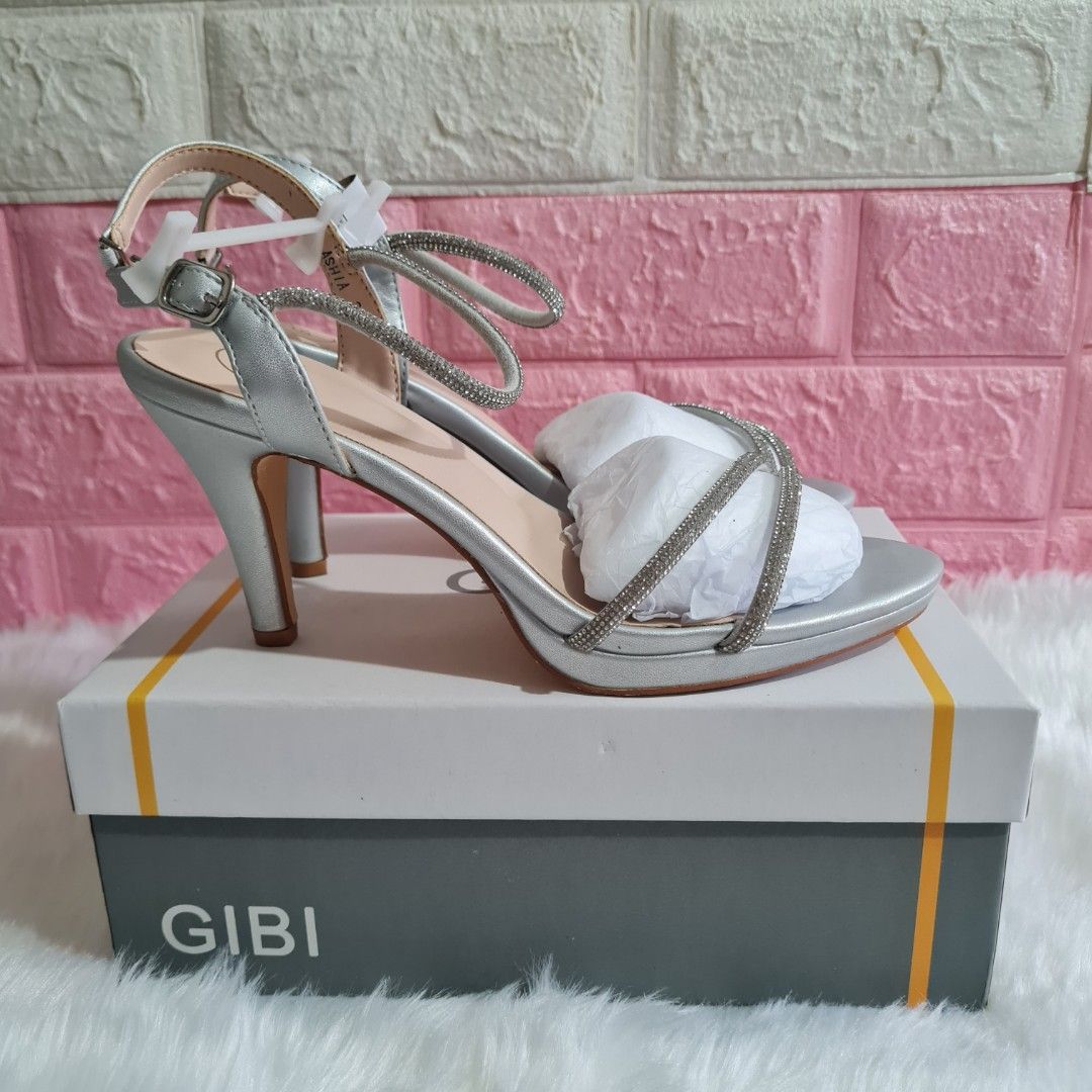 GIBI Ashia Silver Strappy heels (Size 37) (Category: Heels) located in Cavite. Submitted by iammil (Listing ID 1441158072, Image 2). Description: -No flaw -USED TWICE, both during wedding events. -Bought for 1,999 at SM Dept store -Complete Inclusion -Heels: 3.5".
