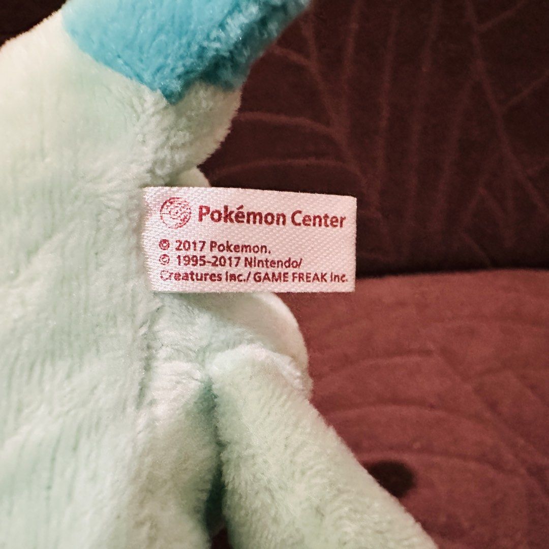 Glaceon Pokemo Plush charm (Category: Toys & Games) located in Mandaluyong City. Submitted by johnmichaelb.reyes (Listing ID 1441373418, Image 3). Description: - Adorable Glaceon plush toy from the official Pokemon Center. - Approximately 6 inches tall, perfect for display or play. - Features a convenient keychain clip, ideal for attaching to bags, backpacks, or keys. - A must-have for any Pokemon enthusiast or collector. - Released in 2017..