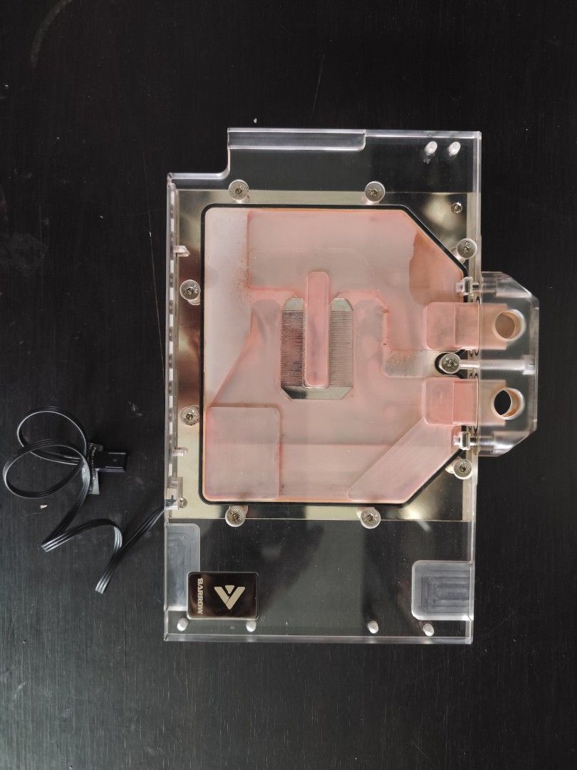 GPU Water Block for RTX 4090 Asus strix (Category: Computer Parts) located in Caloocan City. Submitted by Benvishope (Listing ID 1441374256, Image 3). Description: - Bykski GPU Water Block - Compatible with RTX 3080 and RTX 3090 Founders Edition cards - Features a clear acrylic top and a copper cold plate - Integrated RGB lighting for customizable aesthetics - Minor signs of use visible on the copper plate - Includes original packaging and all ac
