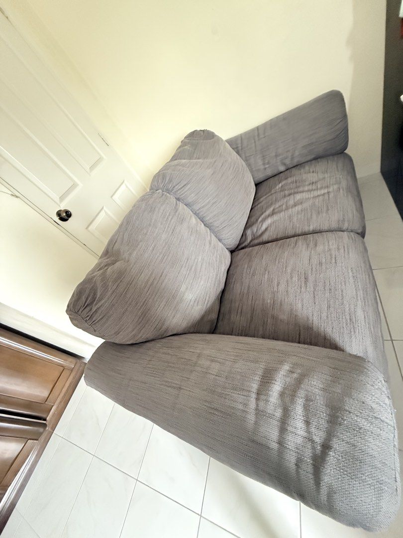 Grey Fabric Sofa (Category: Sofas) located in Malolos. Submitted by shopenjoylowprices (Listing ID 1441233017, Image 1). Description: - Grey fabric sofa - Recliner function included - Still comfortable and fully functional - Pick up only.