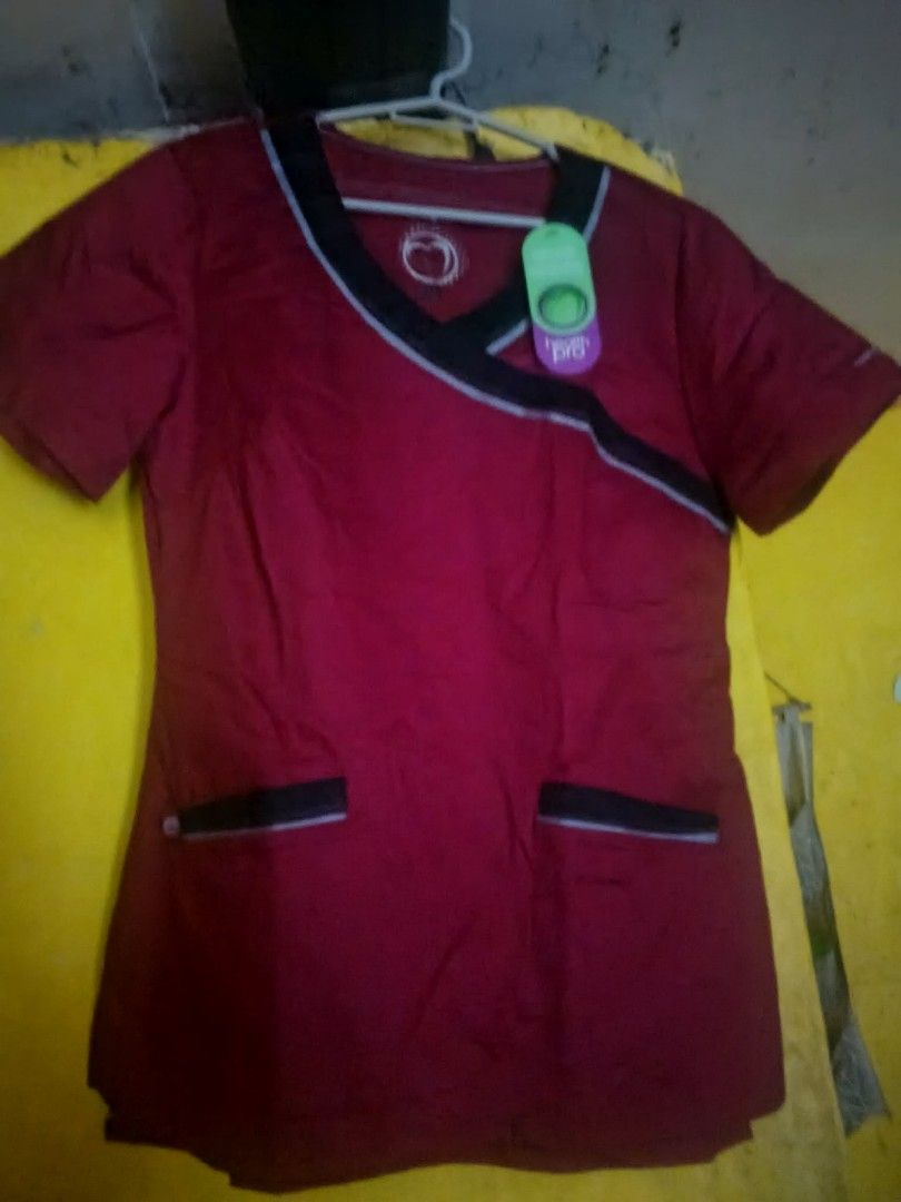 Health Pro Scrub Tops - Various Colors (Category: Others Tops) located in Malabon City. Submitted by giannamrc (Listing ID 1441267838, Image 3). Description: - Bundle of 3 Health Pro scrub tops - Size: Small - Includes: maroon with black trim, grey with red accents, light blue with grey side panels - All tops feature the Health Pro logo - Made from comfortable and durable material - Ideal for healthcare professionals Mode of payment: Gcash Price 