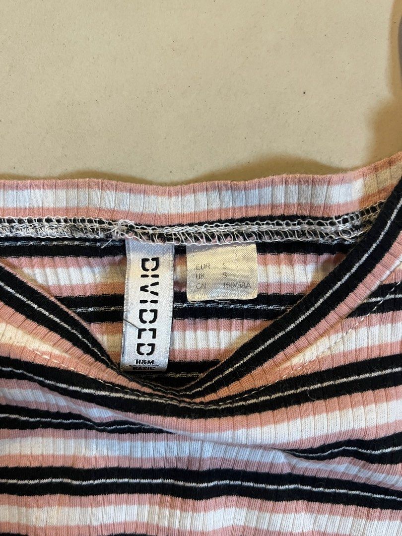H&M Divided Striped Ribbed Cropped Top Size S (Category: Sleeveless) located in Makati City. Submitted by abbynak (Listing ID 1441257641, Image 3). Description: - Cute H&M Divided cropped top - Ribbed and very stretchy material - Black, white, and pink stripe pattern - Short sleeves - Ideal for casual wear - Fits size S.