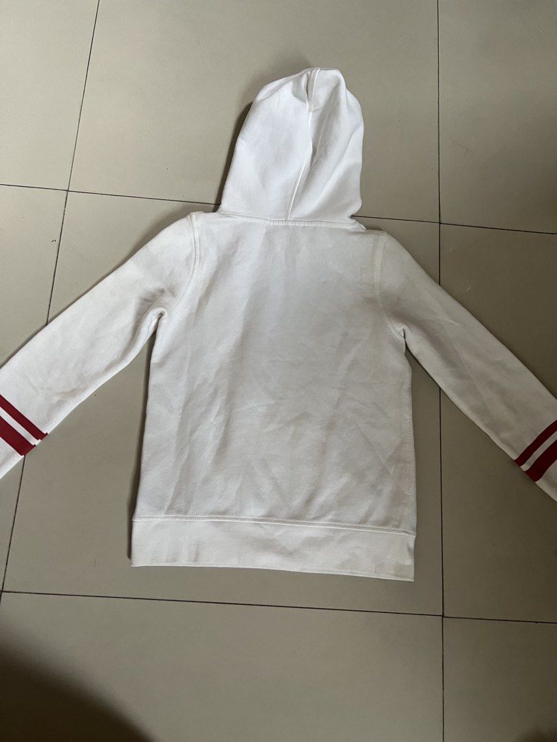 H&M White NASA Hoodie (Category: Babies & Kids Fashion) located in Makati City. Submitted by abbynak (Listing ID 1441224340, Image 2). Description: White H&M hoodie with NASA logo. Red stripes on sleeves. Casual wear. Size 146/152. JUST NEEDS A WASH.
