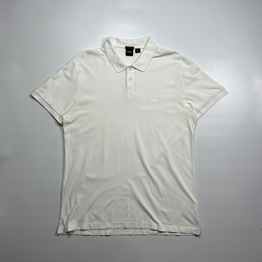 Hugo Boss Polo Shirt (Category: Tshirts & Polo Shirts ) located in Manila. Submitted by stakkhaus_ (Listing ID 1441175775, Image 1). Description: Hugo Boss Polo Shirt Excellent Condition Authentic No flaws Measurement" Fitting Xlarge Frame Width 22 Length 30.