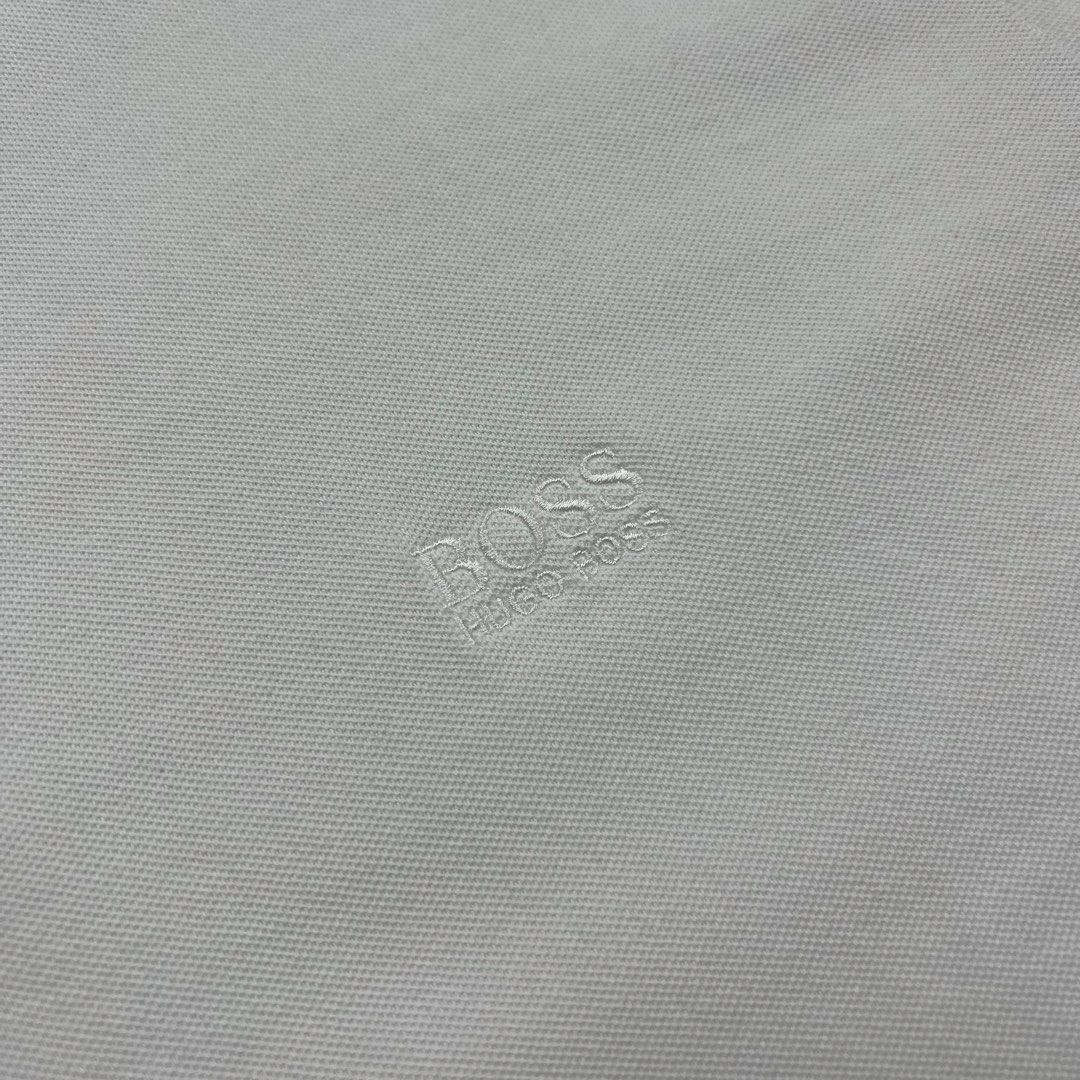 Hugo Boss Polo Shirt (Category: Tshirts & Polo Shirts ) located in Manila. Submitted by stakkhaus_ (Listing ID 1441175775, Image 2). Description: Hugo Boss Polo Shirt Excellent Condition Authentic No flaws Measurement" Fitting Xlarge Frame Width 22 Length 30.