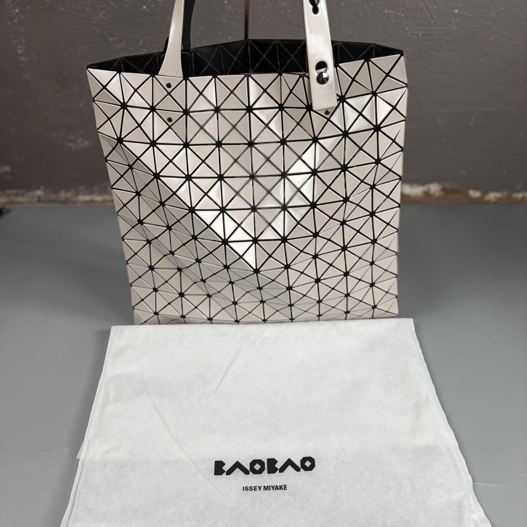 Issey Miyake | Bao Bao - Lucent Tote Bag (Category: Luxury Bags & Wallets) located in Manila. Submitted by yourtherapist_ (Listing ID 1441182256, Image 2). Description: Issey Miyake | Bao Bao - Lucent Tote Bag New, with inclusions Has dust bag and guarantee card. Like new Honest issue Zipper’s starting point is derailed (easy fix). Common problem of zippers. 3,500.