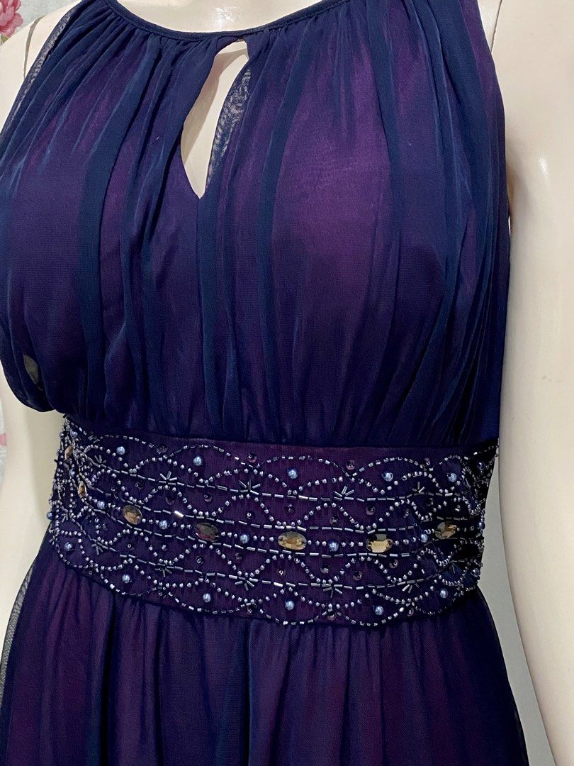 JH Purple dress (Category: Dresses) located in Binan City. Submitted by myutopia28 (Listing ID 1441223130, Image 3). Description: This is a purple sleeveless dress featuring a ruched bodice, keyhole neckline, and a beaded waistline Fits large to xl frame.