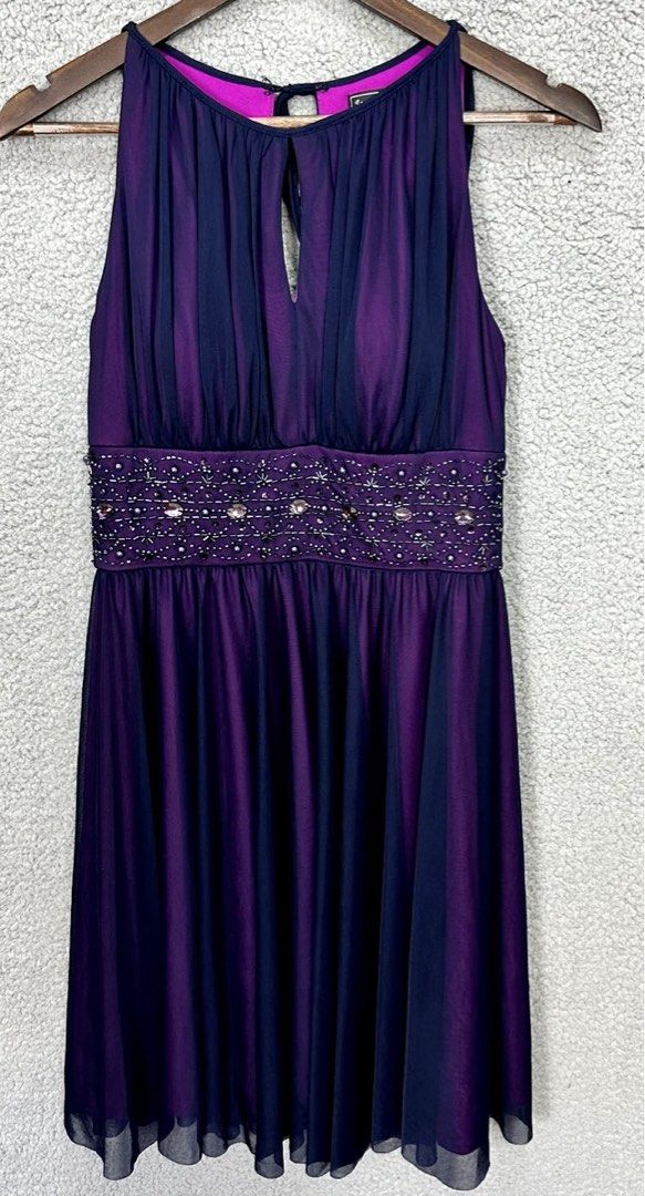 JH Purple dress (Category: Dresses) located in Binan City. Submitted by myutopia28 (Listing ID 1441223130, Image 2). Description: This is a purple sleeveless dress featuring a ruched bodice, keyhole neckline, and a beaded waistline Fits large to xl frame.