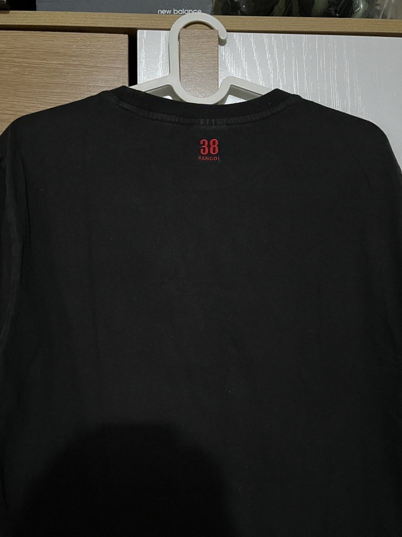 Kangol Black T-Shirt XL (Category: Tshirts & Polo Shirts ) located in Manila. Submitted by shopthevintage (Listing ID 1441346741, Image 3). Description: - Black Kangol T-shirt - Size: XL - Small red Kangol logo on the front - Red '38 Kangol' graphic on the back near the neck - Comfortable for everyday wear.