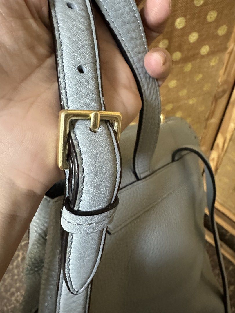 Kate Spade Light Blue Leather Backpack with Tassels (Category: Luxury Bags & Wallets) located in Tarlac. Submitted by relovedph_02 (Listing ID 1441364316, Image 3). Description: Guaranteed Authentic, comes with care card. - Light blue Kate Spade backpack - Textured leather material - Decorative eyelet detailing on flap - Two tassel accents - Adjustable shoulder straps - Gold hardware - Ideal for everyday use or travel.