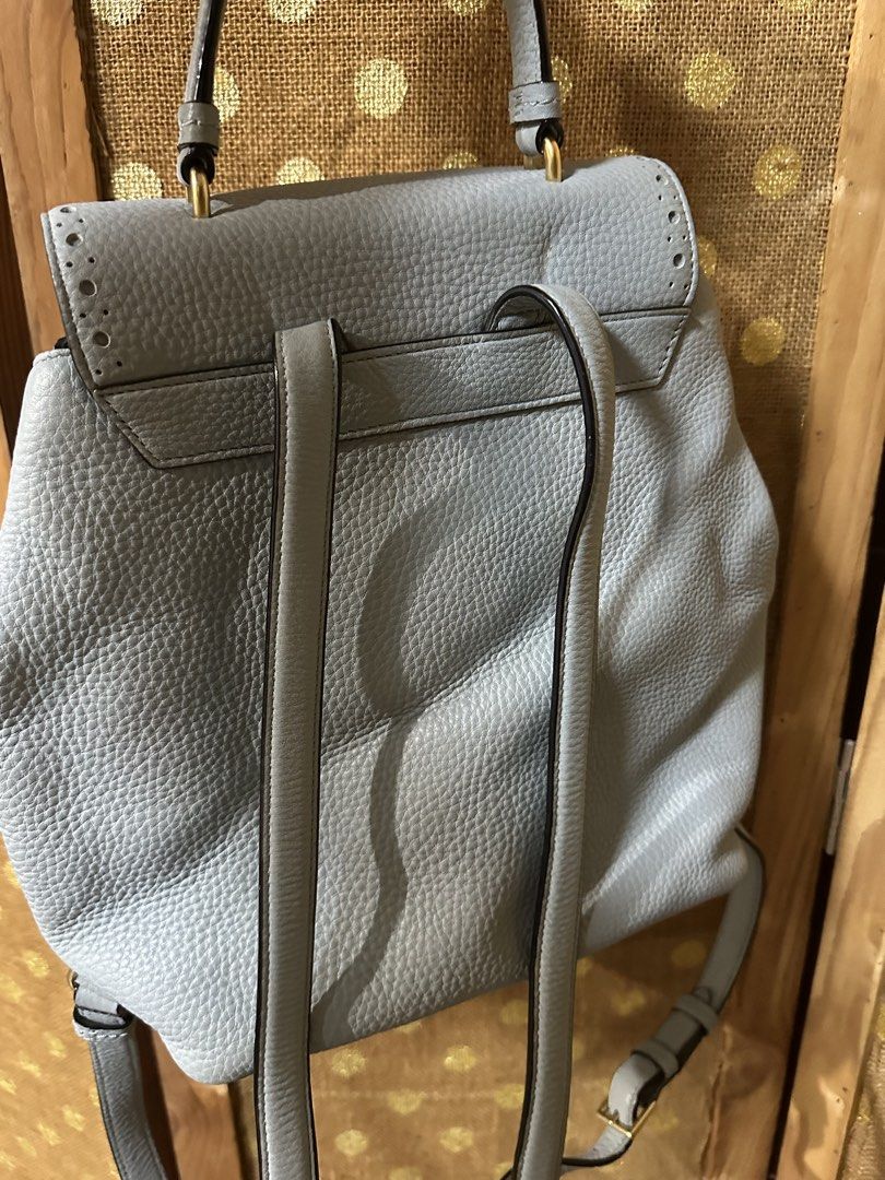 Kate Spade Light Blue Leather Backpack with Tassels (Category: Luxury Bags & Wallets) located in Tarlac. Submitted by relovedph_02 (Listing ID 1441364316, Image 2). Description: Guaranteed Authentic, comes with care card. - Light blue Kate Spade backpack - Textured leather material - Decorative eyelet detailing on flap - Two tassel accents - Adjustable shoulder straps - Gold hardware - Ideal for everyday use or travel.