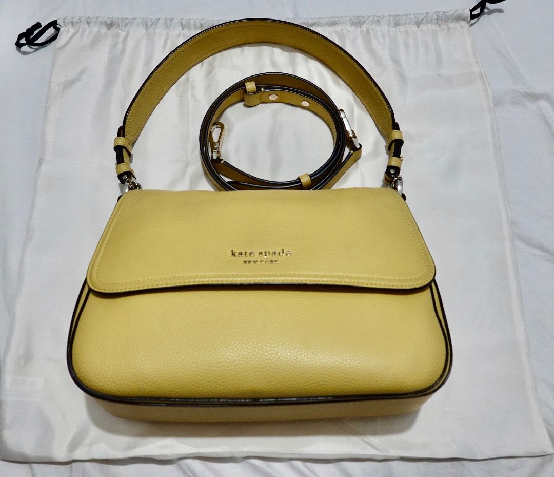 Kate Spade Yellow Leather Shoulder Bag (Category: Shoulder Bags) located in Paranaque City. Submitted by katl0 (Listing ID 1441238488, Image 1). Description: - Condition: Very good since it wasn’t used much. No peeling. - Calf leather shoulder bought in BGC last year - Pebble leather texture - Includes adjustable detachable strap - Comes with its original dust bag - Interior is clean without any stains (I used a bag organizer) - RFS: moving abroa