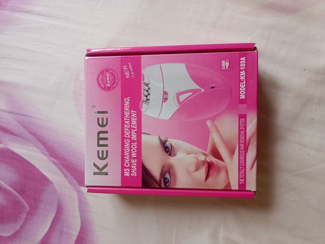 Kemei MS Charging Defeathering Epilator KM-189A (Category: Hair Removal) located in Tarlac. Submitted by thefilipinabratz (Listing ID 1441194320, Image 1). Description: - Kemei Epilator Model KM-189A - Color: Pink and White - Rechargeable for cordless convenience - Includes charging cable and cleaning brush - Achieve smooth, hair-free skin easily 💰 Price: ₱350 (Negotiable) 📦 Shipping fee will be shouldered by the buyer. Additional shipping fee 