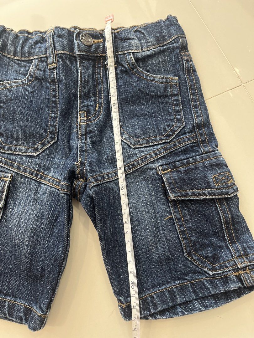 Kids Denim Cargo Shorts (Category: Babies & Kids Fashion) located in Singapore. Submitted by mangopumpkin (Listing ID 1441214597, Image 3). Description: - Kids' blue denim cargo shorts - Comfortable with button and zip closure - Multiple front and side pockets - Back pockets included - Durable and great for everyday wear.