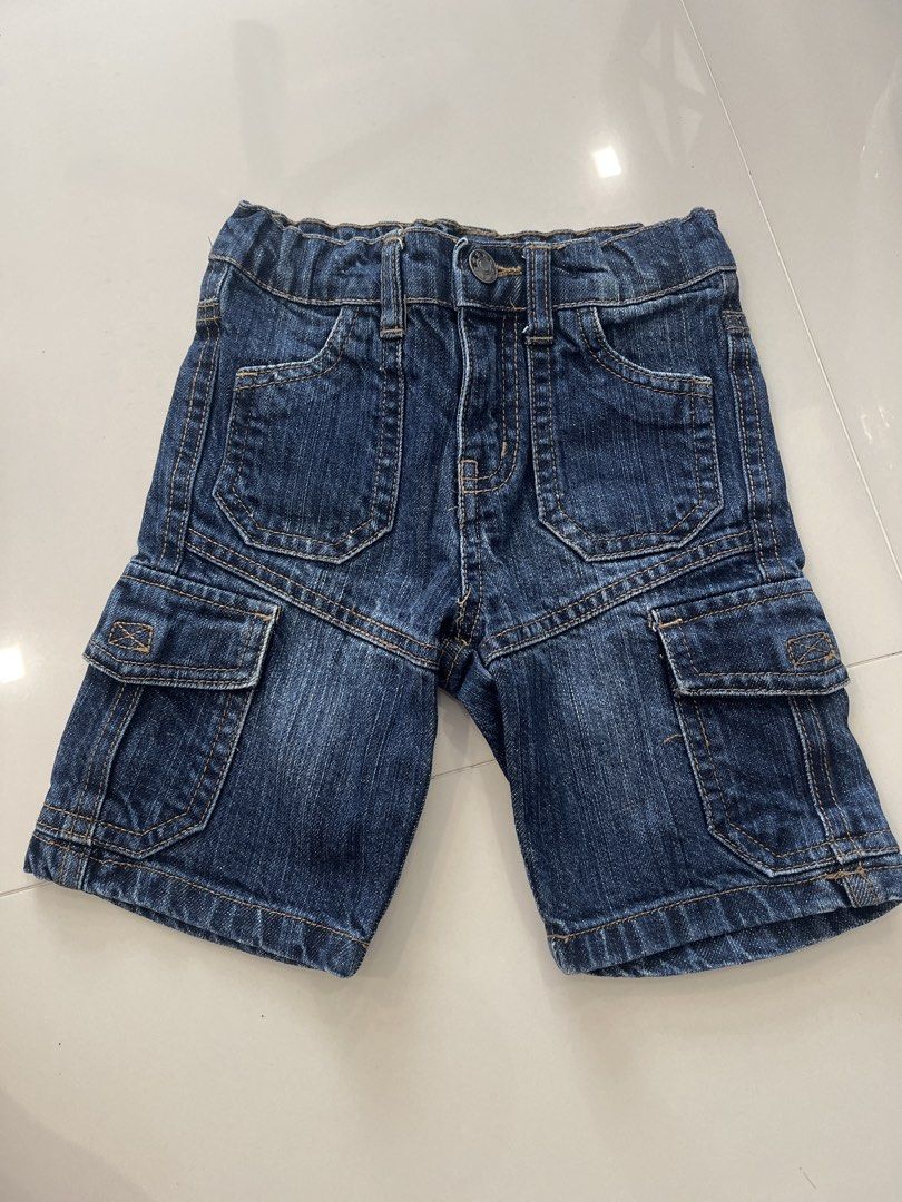 Kids Denim Cargo Shorts (Category: Babies & Kids Fashion) located in Singapore. Submitted by mangopumpkin (Listing ID 1441214597, Image 1). Description: - Kids' blue denim cargo shorts - Comfortable with button and zip closure - Multiple front and side pockets - Back pockets included - Durable and great for everyday wear.