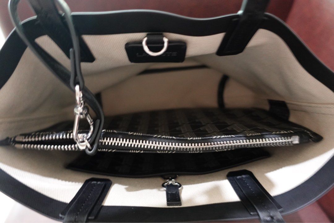 Lacoste Zely Canvas Small Tote Bag (Category: Tote Bags) located in Santa Rosa. Submitted by mari3vic (Listing ID 1441250643, Image 2). Description: - Authentic Lacoste small tote bag - Signature 'L' monogram pattern (mono noir beige) - Includes detachable inner pouch - Ideal for everyday use - Original tags still attached.