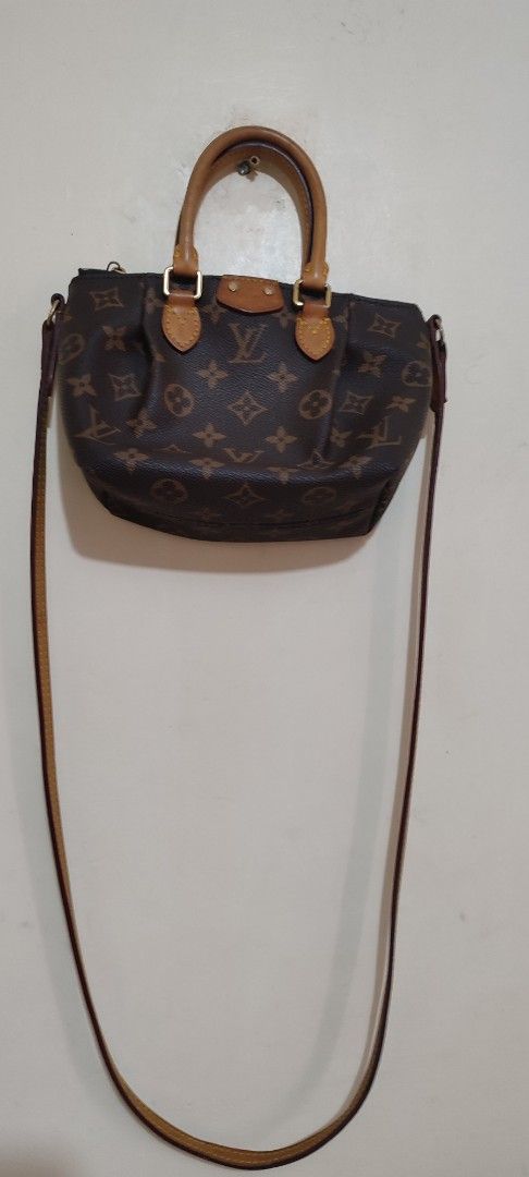 Louis Vuitton Turenne Nano Bag (Category: Luxury Bags & Wallets) located in Caloocan City. Submitted by guiltypleasures75 (Listing ID 1441206721, Image 2). Description: - LV Turenne Nano bag - Classic monogram canvas - Genuine vachetta leather trim - Versatile: can be worn crossbody and shoulder bag - Secure zipper closure - Ideal size for carrying your essentials.