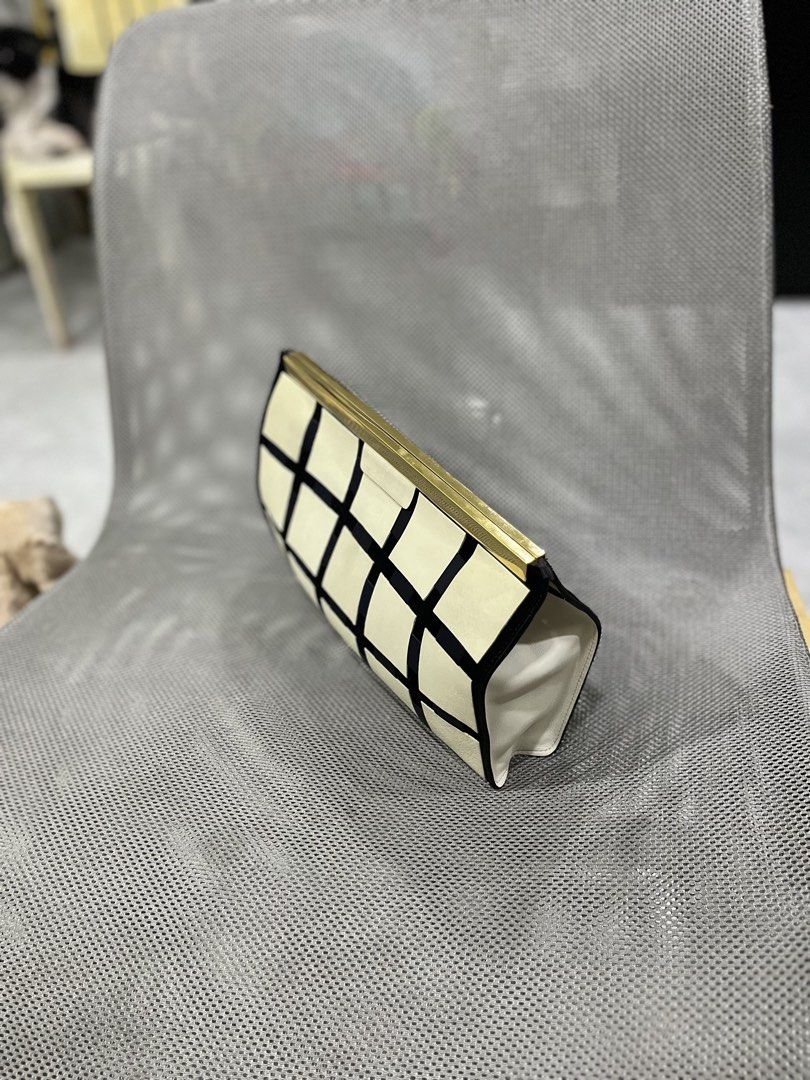 Marni - Marni Clutch Bag (Category: Luxury Bags & Wallets) located in Taguig. Submitted by shhhhselection (Listing ID 1441364389, Image 2). Description: DECLUTTERRING “Marni Clutch Bag with Gold Hardware” Authentic Good as New - Rank S Kasya Iphone 17 Pro Max and 1 Million in Cash hahaha No Issue Bag Only 2498 Pesos Only 📍Taguig City.