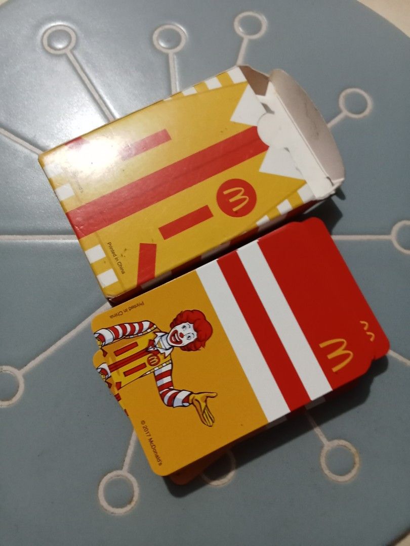 McDonald's Ronald McDonald Playing Cards (Category: Board Games & Puzzles) located in Bocaue. Submitted by marajapansurplus (Listing ID 1441286026, Image 1). Description: - McDonald's playing cards featuring Ronald McDonald and iconic characters. - Comes with the original, classic McDonald's branded box. - Ideal for collectors of McDonald's memorabilia. - Great for playing card games with a fun theme. - Unique designs showcase various McDonald's 