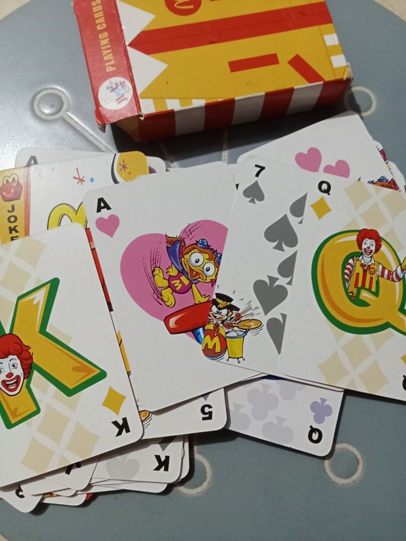 McDonald's Ronald McDonald Playing Cards (Category: Board Games & Puzzles) located in Bocaue. Submitted by marajapansurplus (Listing ID 1441286026, Image 3). Description: - McDonald's playing cards featuring Ronald McDonald and iconic characters. - Comes with the original, classic McDonald's branded box. - Ideal for collectors of McDonald's memorabilia. - Great for playing card games with a fun theme. - Unique designs showcase various McDonald's 