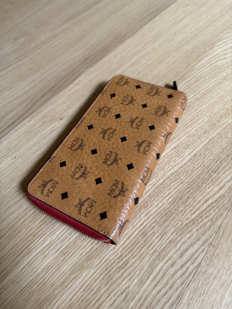MCM Visetos Cognac Zip Around Wallet (Category: Luxury Bags & Wallets) located in Pasay City. Submitted by elleventh (Listing ID 1441218540, Image 2). Description: - Rank SA-A - Can fit passport - 7.25” x 4” x 1” All items are guaranteed authentic and are personally curated and sourced by the founder. If you wish to get a certificate of authenticity from a trusted third party company, you may message us for more details. Elleventh PH is not affil