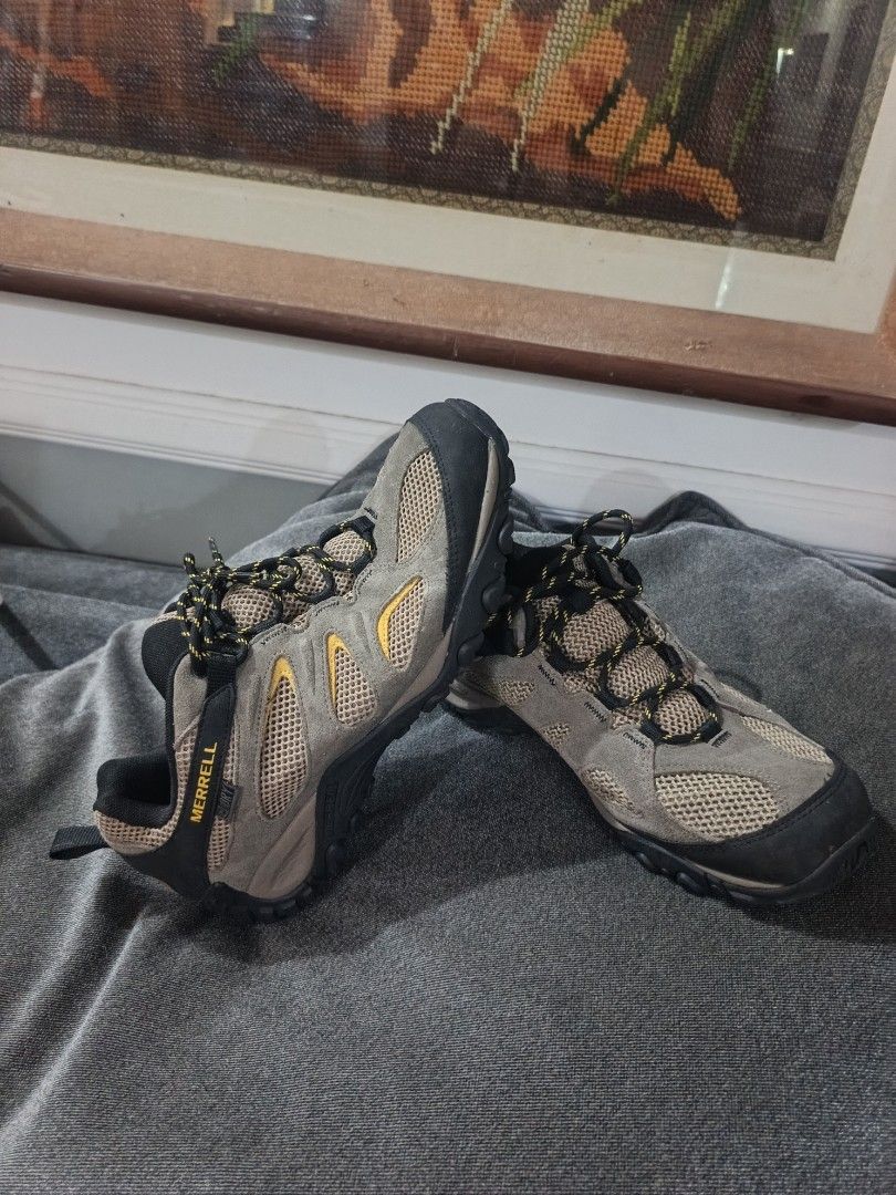 Merrell Men's Hiking Shoes (Category: Sneakers) located in Manila. Submitted by cayaowilfr59065 (Listing ID 1441377114, Image 1). Description: - Merrell Men's Hiking Shoes - Color: Tan and Black - Closure: Lace-up - Features: Durable sole with excellent grip - Ideal for: Trails and outdoor adventures - Ready for your next hike!.