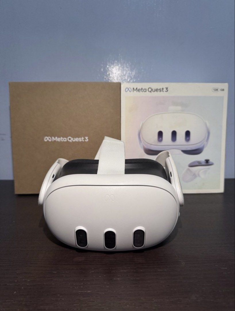 Meta Quest 3 128GB (Category: Virtual Reality) located in Singapore. Submitted by swiftclouds (Listing ID 1441296031, Image 2). Description: Selling my Meta Quest 3 128GB - fully functional, very well taken care of, and complete with accessories. Features & Condition: • Bought in the US: Last 2024 • No issues, working perfectly • 2 Original Controllers included • 2 Batteries included (Free) • Fully tested and ready to use.