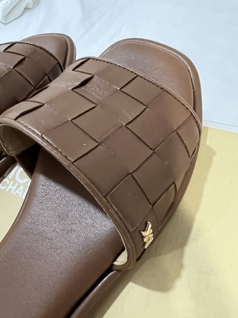 Michael Kors Brown Woven Slides Sandals (Category: Flats & Sandals) located in Pasig City. Submitted by reedcruz (Listing ID 1441345202, Image 2). Description: Michael Kors Hayworth Woven Leather Slide Sandal Size 6.5 Used twice Bought from MK Shangri-La for 8,250. .