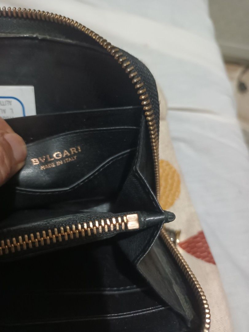 Mine auth Bulgari long wallet (Category: Luxury Bags & Wallets) located in Muntinlupa City. Submitted by youngforest_acb081 (Listing ID 1441290685, Image 3). Description: super ganda leather wallet no flaws sign of used auth bulgari long wallet.