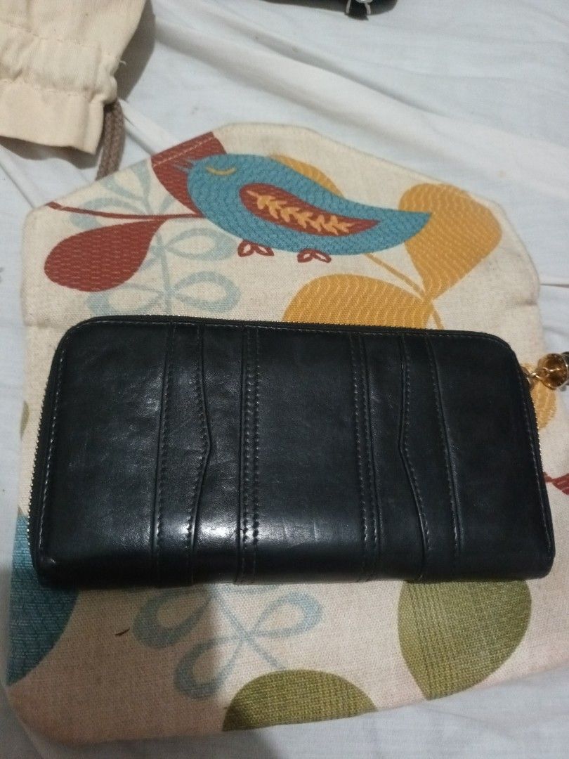 Mine auth Bulgari long wallet (Category: Luxury Bags & Wallets) located in Muntinlupa City. Submitted by youngforest_acb081 (Listing ID 1441290685, Image 1). Description: super ganda leather wallet no flaws sign of used auth bulgari long wallet.