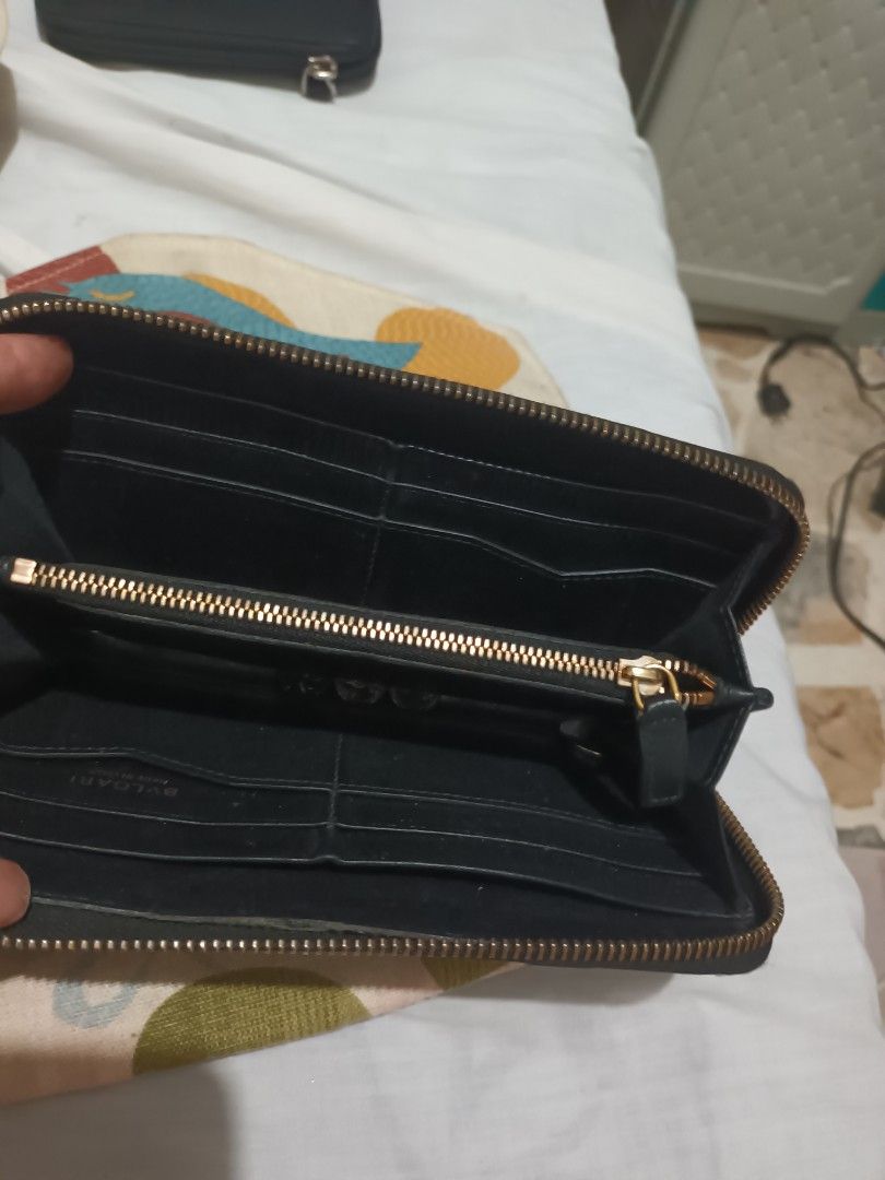 Mine auth Bulgari long wallet (Category: Luxury Bags & Wallets) located in Muntinlupa City. Submitted by youngforest_acb081 (Listing ID 1441290685, Image 2). Description: super ganda leather wallet no flaws sign of used auth bulgari long wallet.