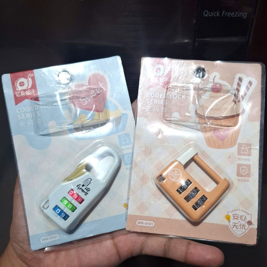 Mini Cute Coded Lock - sold each (Category: Locks, Doors & Gates) located in Quezon City. Submitted by an.marie (Listing ID 1441256563, Image 1). Description: - Two cute 3-digit coded locks available. - Colors: Orange or White (with ice cream design). - Ideal for securing luggage, diaries, or school bags. - Comes brand new in original packaging. - Default combination code is 000..