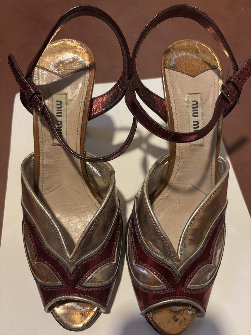Miu Miu Metallic Peep-Toe Heels (Category: Heels) located in Manila. Submitted by danidanidani213 (Listing ID 1441264188, Image 1). Description: - Miu Miu heels - Metallic finish in gold and deep red - Peep-toe design - Ankle strap - Unique statement piece - Size 37.