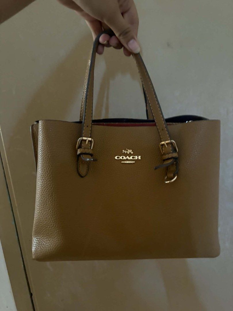Mollie tote coach bag (Category: Luxury Bags & Wallets) located in Manila. Submitted by clevermoon-97f6 (Listing ID 1441284319, Image 1). Description: Mollie coach tote barely used No dust bag.