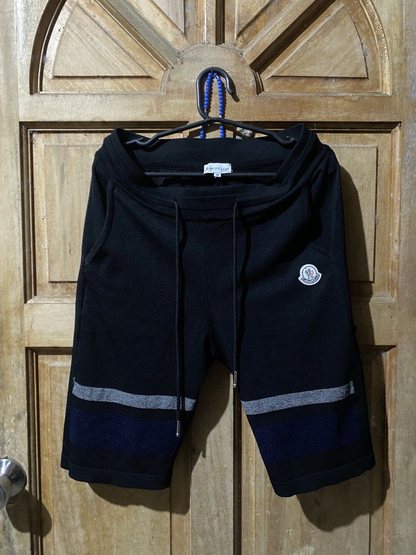 Moncler Black Sweat Shorts Size M (Category: Shorts) located in Daet. Submitted by leithrift (Listing ID 1441303411, Image 1). Description: Moncler sweat shorts in black. Size M. Features the iconic Moncler logo patch on the left leg. Also has a small pocket on the back right. Drawstring waist for adjustable fit. Nice detailing on the lower legs..