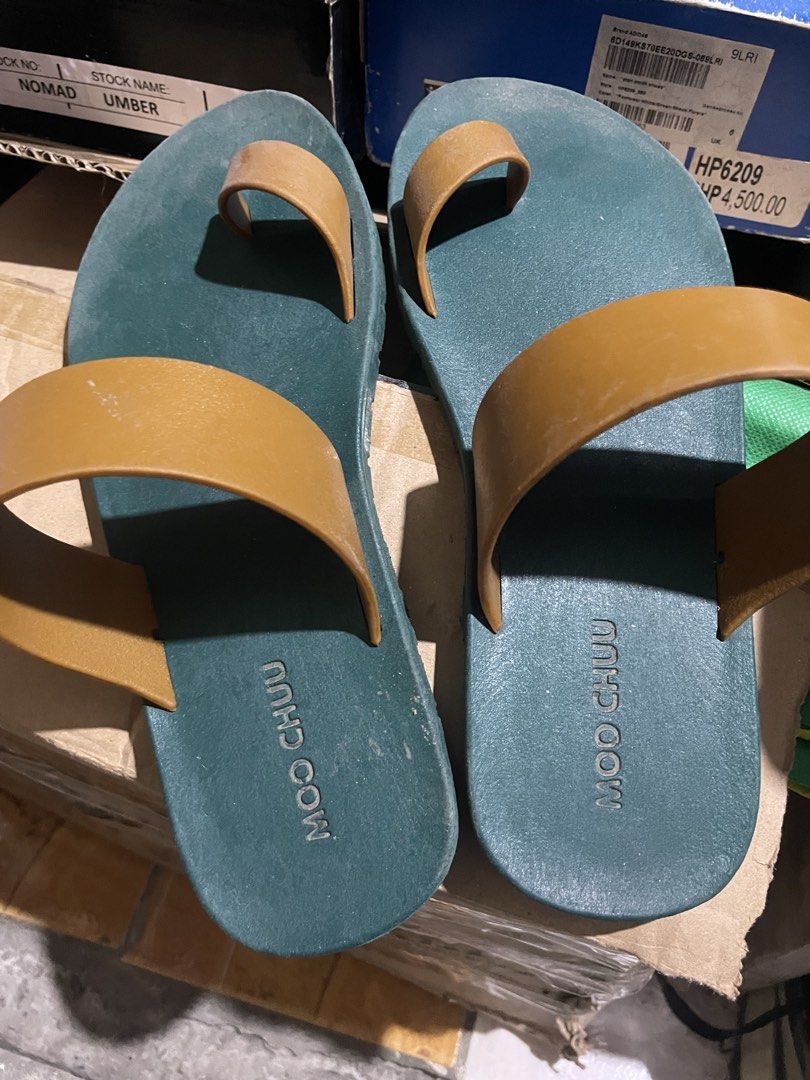 Moo Chu Flip Flop Sandals (Category: Flats & Sandals) located in Manila. Submitted by argche (Listing ID 1441331329, Image 3). Description: - Brand: Moo Chu - Color: Green and Tan - Style: Flip Flop Sandals - Features: Comfortable, easy slip-on - Condition: Soles have wear and tear, with added grip pads - Ideal for: Casual wear.