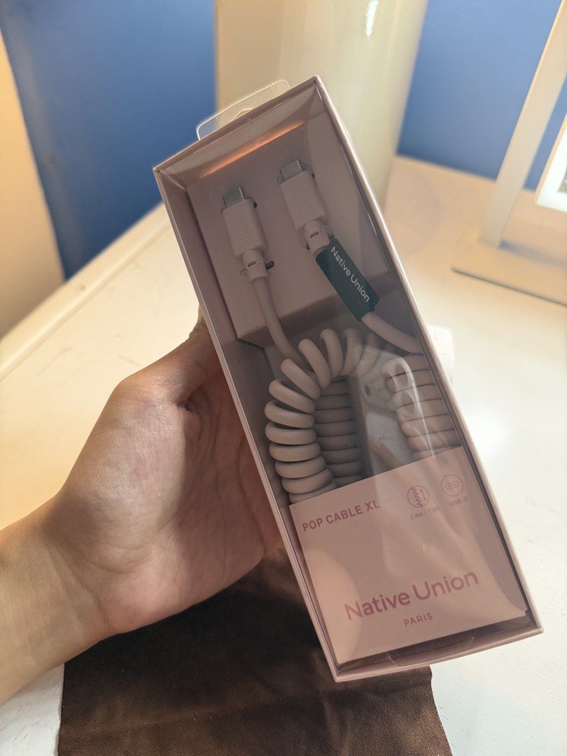 Native Union POP Cable XL USB-C to USB-C Pink (Category: Chargers & Cables) located in Manila. Submitted by win_winea (Listing ID 1441283760, Image 2). Description: - Native Union POP Cable XL - Color: Pink - Type: Coiled charging cable - Connectors: USB-C to USB-C - Length: Approx. 2.4m when stretched - Ideal for charging phones and devices - Original packaging included - up to 60w Bought from Digital Walker Still Under warranty Receipt and Warr
