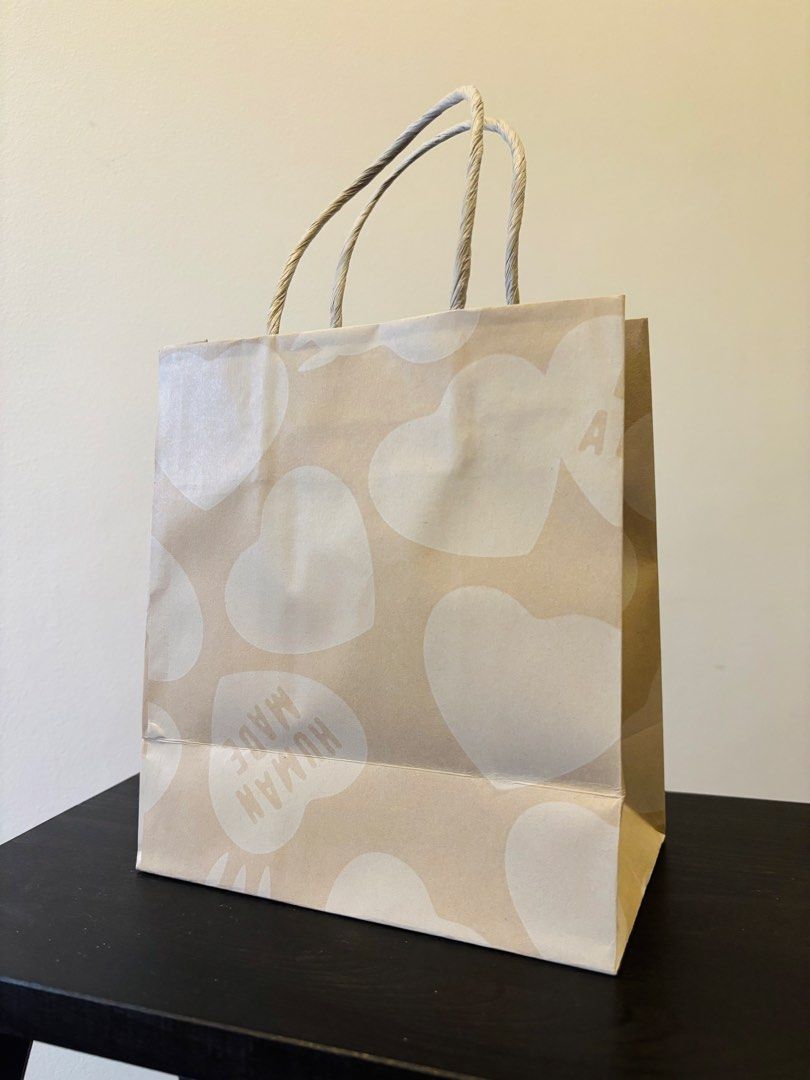 NEW Authentic HUMAN MADE Small Paperbag from Japan (Category: Tote Bags) located in Paranaque City. Submitted by mysinfulindulgence (Listing ID 1441225019, Image 2). Description: Guaranteed authentic Human Made paperbag New, unused from Human Made Japan Your purchase will help feed our NSHA Cats 🐈‍⬛🐈 Pick up loc: bf homes paranaque Mop: bdo / gcash Mod: ggx, jnt, lbc, grab or lalamove.