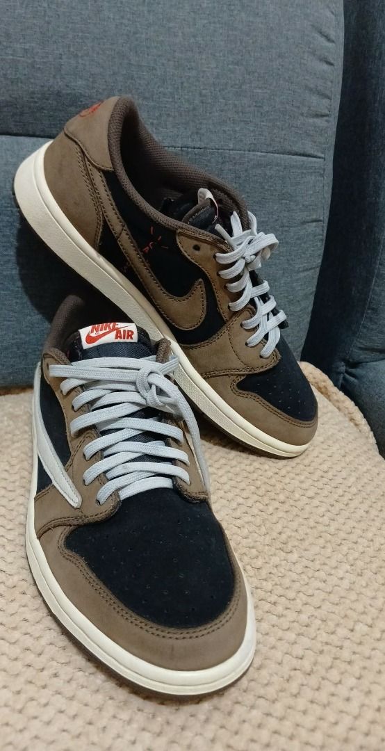 Nike Air Jordan 1 Low Travis Scott (Category: Sneakers) located in Quezon City. Submitted by kuya.luxsneakers_172_949 (Listing ID 1441241289, Image 1). Description: - Travis Scott Jordan 1 Lows - Classic brown and black colorway - Includes light grey laces - Essential for sneaker collectors - Ideal for everyday casual style.