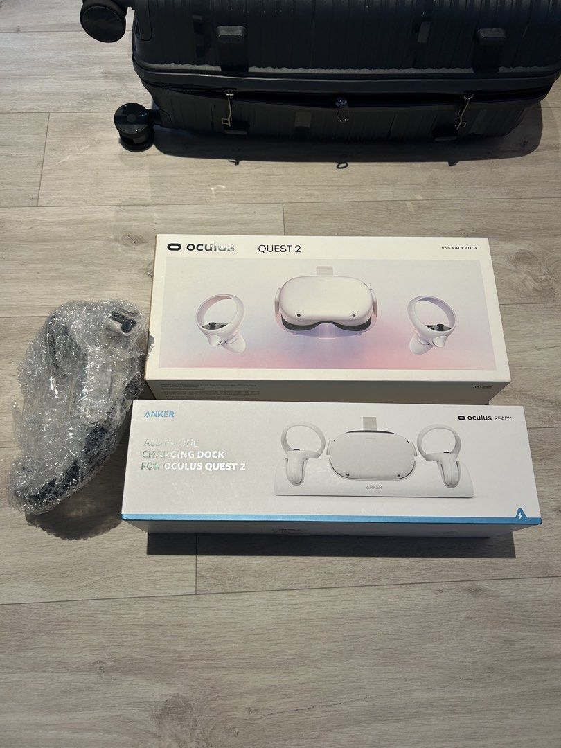 Oculus Quest 2 VR Headset with Anker Charging Dock (Category: Virtual Reality) located in Singapore. Submitted by arfandi.azzahar (Listing ID 1441211929, Image 1). Description: - Oculus Quest 2 VR headset - Includes controllers - Original packaging - Anker All-in-One Charging Dock (charges headset & controllers).