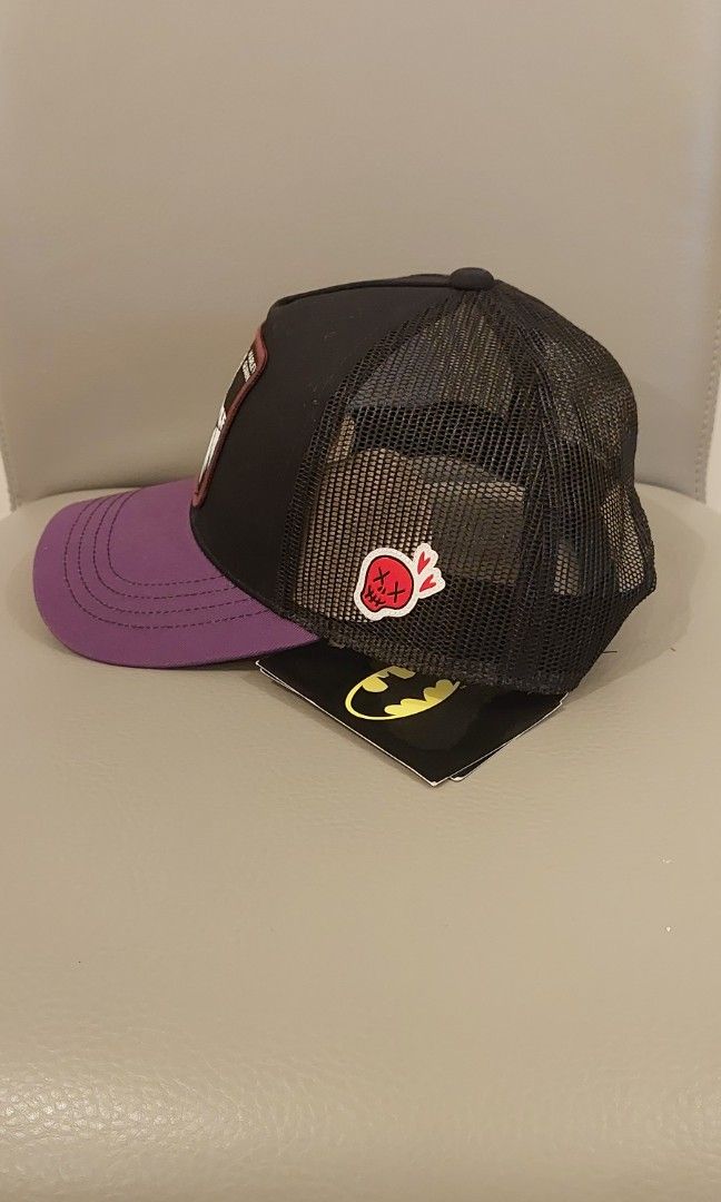 Official DC Harley Quinn Trucker Cap (Category: Caps & Hats) located in Makati City. Submitted by geesharma_08 (Listing ID 1441315393, Image 2). Description: BNWT! DC/Warner Bro's merch exclusively made for Japan 🇯🇵 Hard-to-find #HarleyQuinn trucker cap with skull detail on the side. Fits all with adjustable snapback strap. Pick-up or Shipping Fee c/o Buyer.