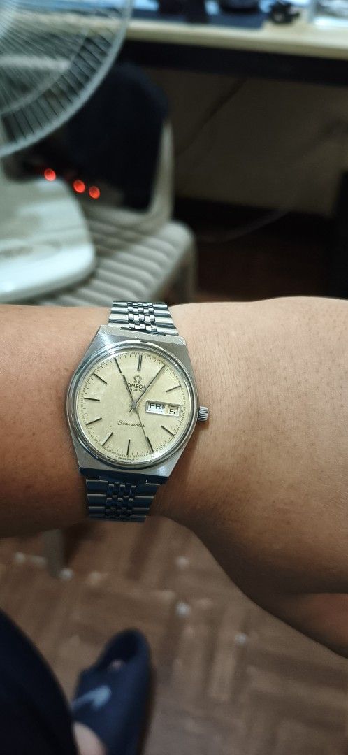 Omega Seamaster Automatic Day Date (Category: Luxury Watches) located in Manila. Submitted by charlesuy21 (Listing ID 1441186188, Image 1). Description: - Automatic movement - Day and date display - Silver sunburst dial - Stainless steel case and bracelet - Vintage piece, believed to be from the late 1970s to early 1980s - Running condition - Visible patina on dial - No box and papers - Sealed shut at the back of the case Selling this for 30k neg